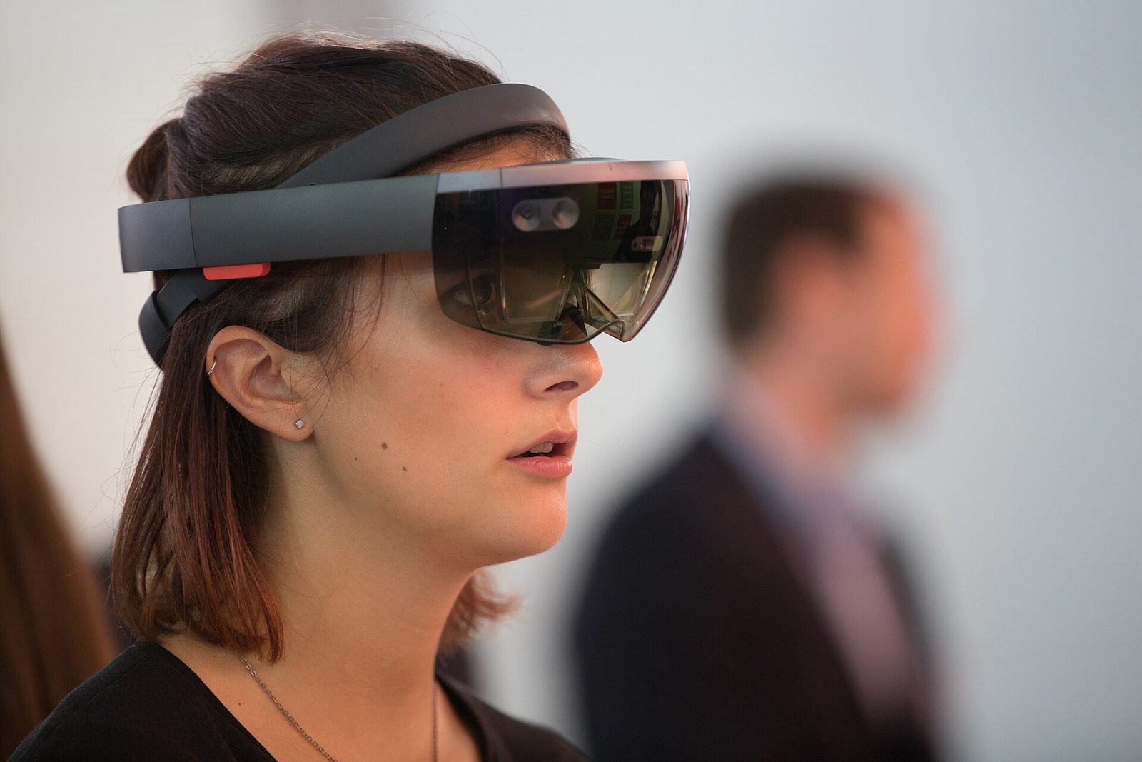 A woman wearing a HoloLens mixed reality headset